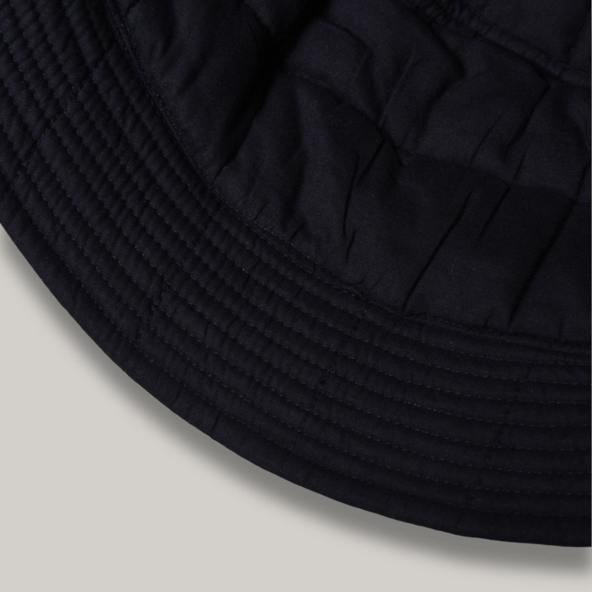 KARDO QUILTED BUCKET HAT - SHIBORI INDIGO